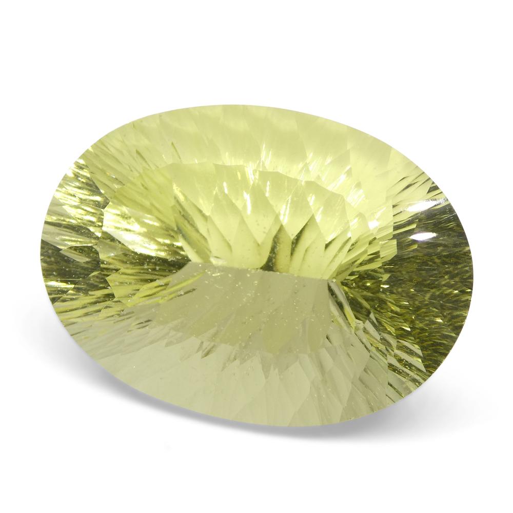 59.78ct Brazilian Lemon Citrine Oval Fantasy Cut, vibrant yellow gemstone from SkyJems' premium loose stone collection
