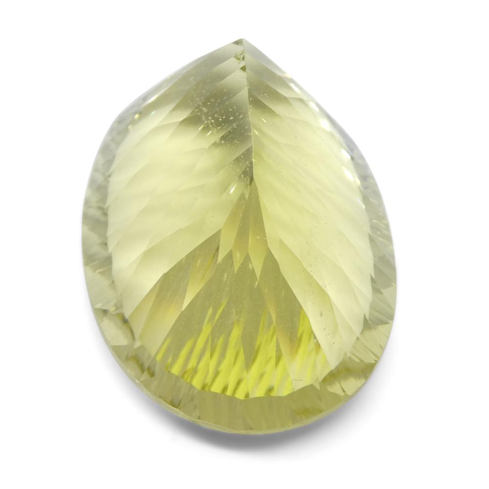 59.78ct Brazilian Lemon Citrine Oval Fantasy Cut, vibrant yellow gemstone from SkyJems' premium loose stone collection