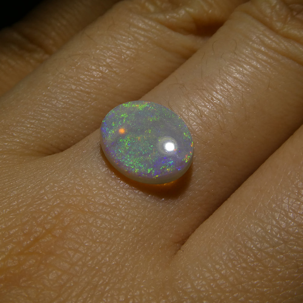 1.72ct White Opal Cabochon from Australia with Play of Color, premium gemstone by SkyJems Canadian gem specialists