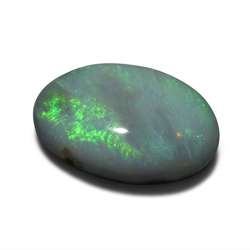 2.94ct Australian Black Opal with vibrant play of color, oval cabochon cut - premium gemstone from SkyJems