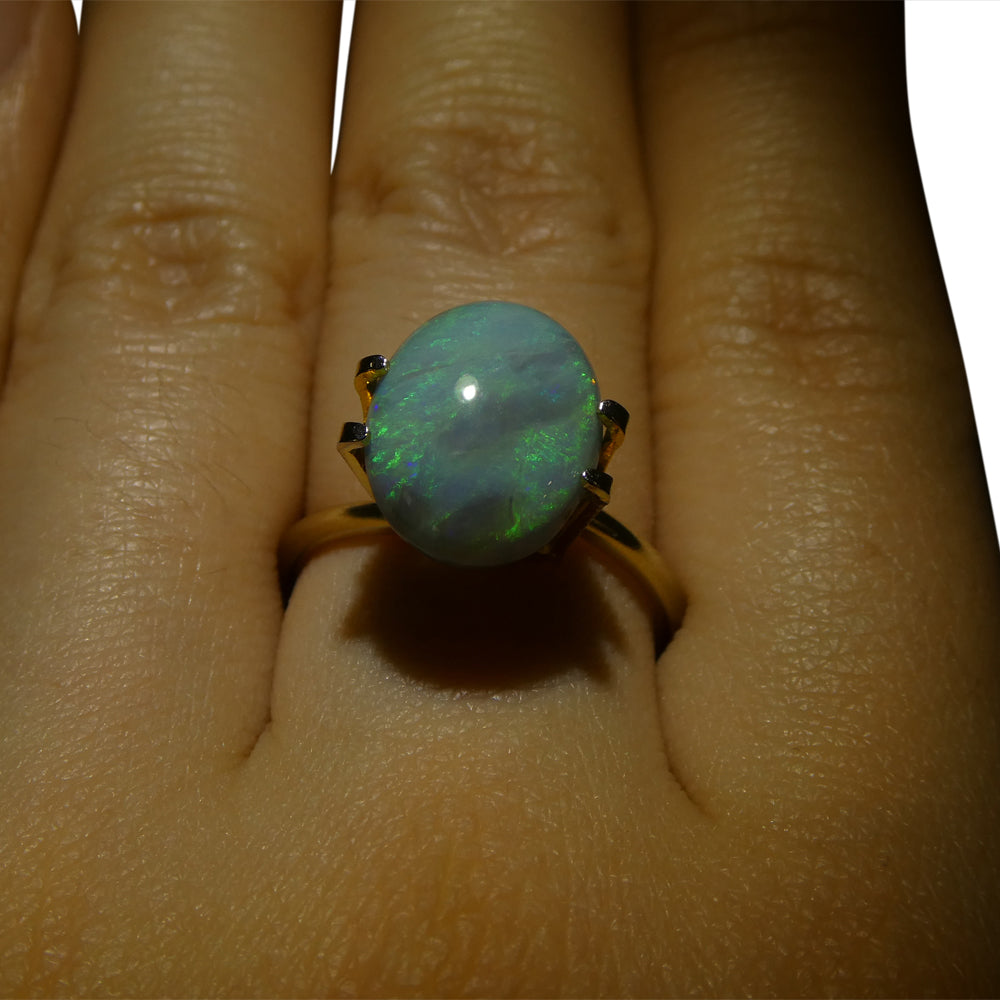 2.94ct Australian Black Opal with vibrant play of color, oval cabochon cut - premium gemstone from SkyJems