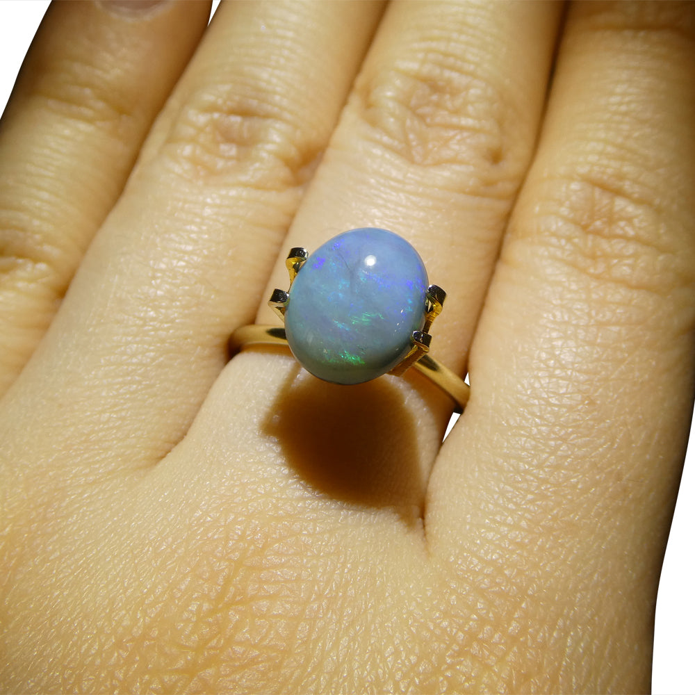 2.37ct Australian Black Opal with vibrant play of color, oval cabochon cut - premium gemstone from SkyJems' curated collectio