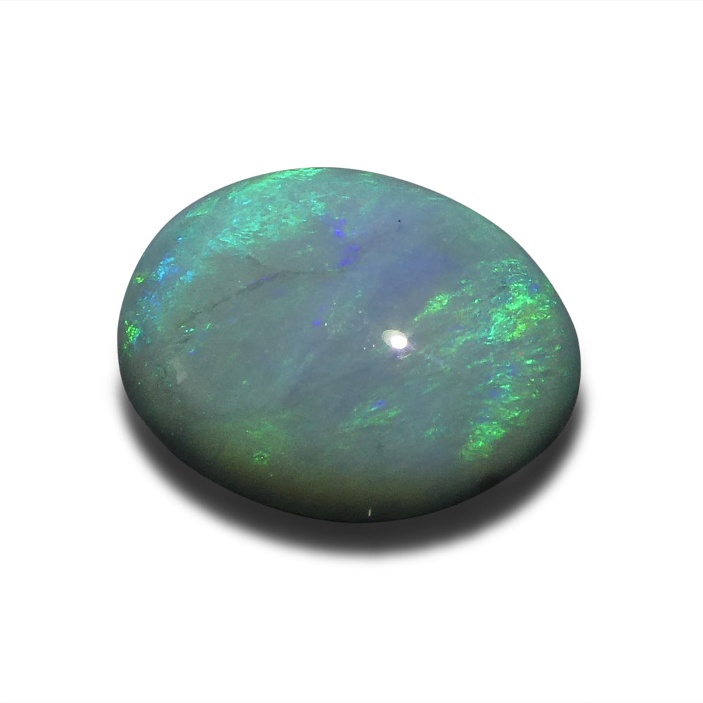 2.37ct Australian Black Opal with vibrant play of color, oval cabochon cut - premium gemstone from SkyJems' curated collectio