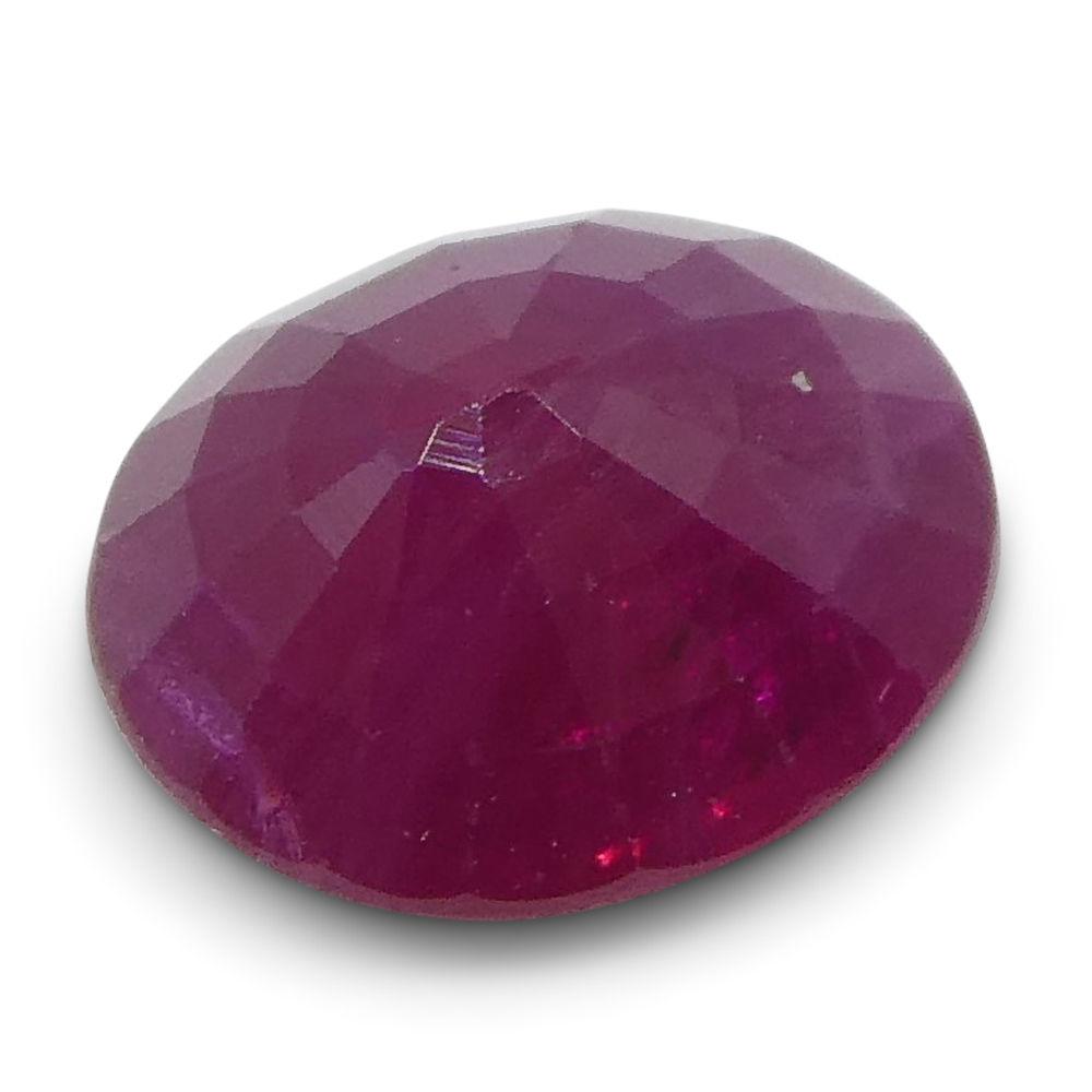 SkyJems 0.75 ct Oval Burma Ruby: vibrant red corundum gemstone, classic modified brilliant cut, premium quality