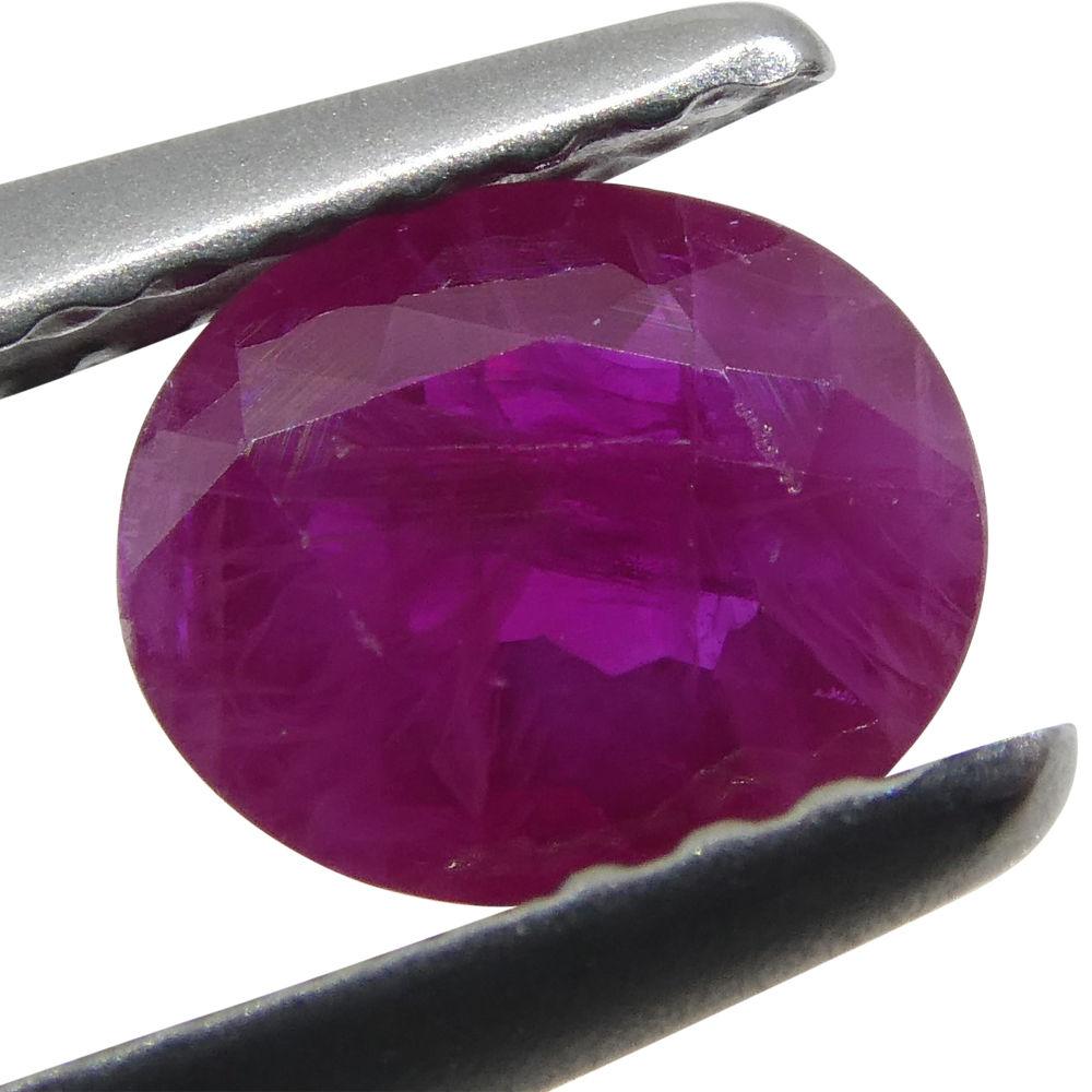 SkyJems 0.75 ct Oval Burma Ruby: vibrant red corundum gemstone, classic modified brilliant cut, premium Myanmar origin