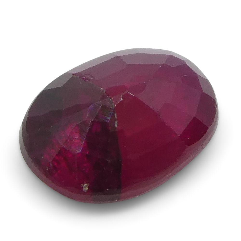 0.71 ct Oval Burma Ruby in vibrant red, precision-cut single stone from SkyJems Canadian gemstone specialists
