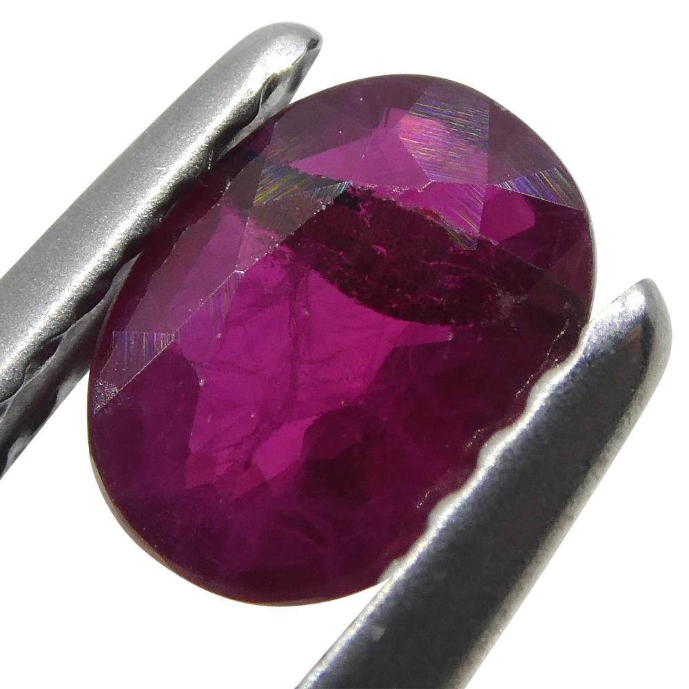 0.71 ct Oval Burma Ruby in vibrant red, precision-cut single stone from SkyJems Canadian gemstone experts since 1967