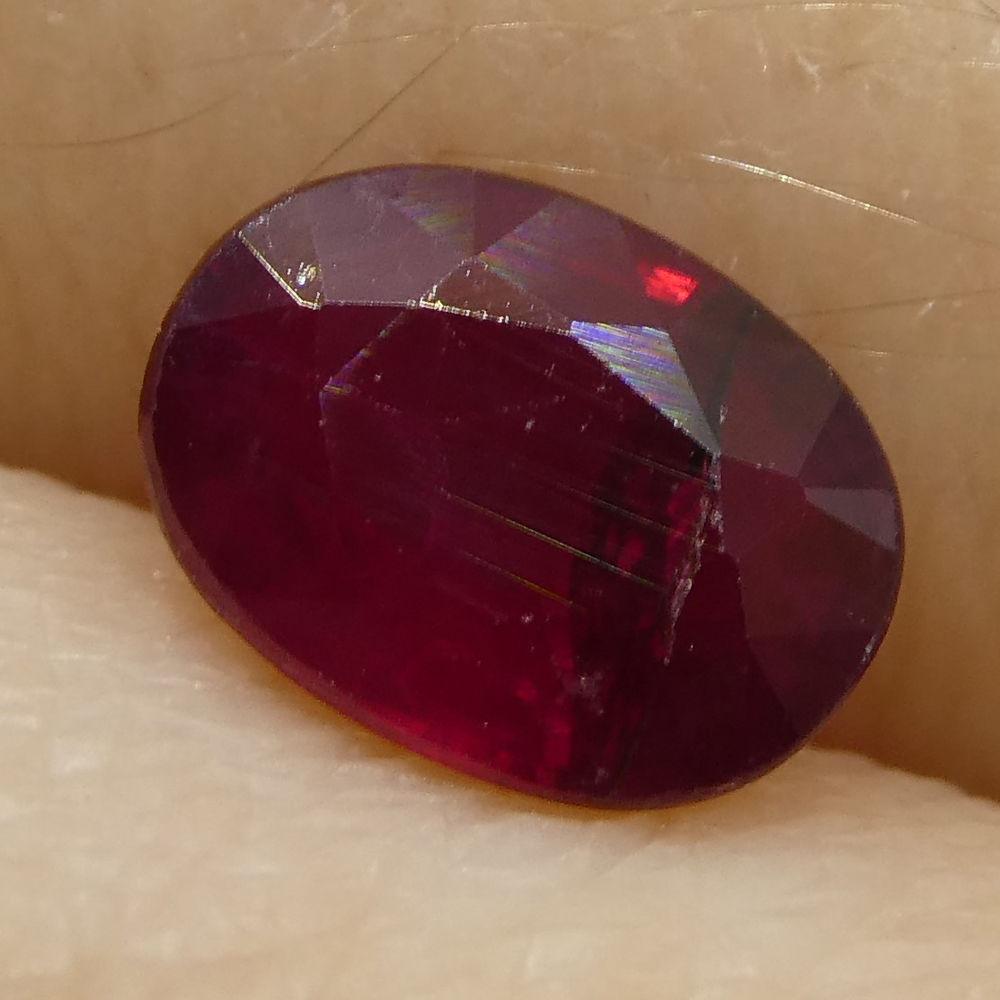 0.71 ct Oval Burma Ruby in vibrant red, precision-cut Modified Brilliant style by SkyJems Canadian gemstone experts