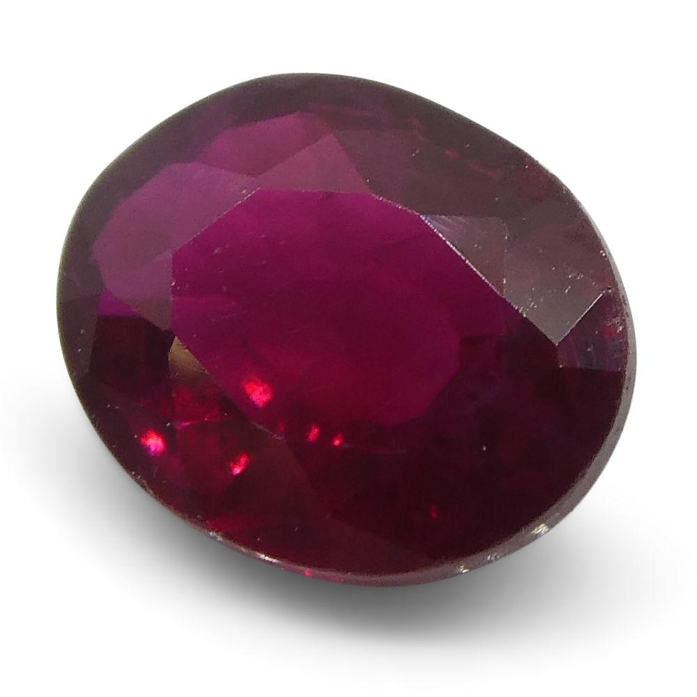 0.67 ct Oval Burma Ruby in vibrant red, precision-cut Modified Brilliant style by SkyJems Canadian gemstone experts