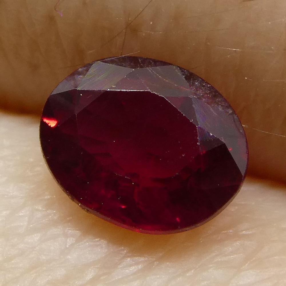 0.67 ct Oval Burma Ruby in vibrant red, precision-cut single stone from SkyJems Canadian gemstone experts since 1967