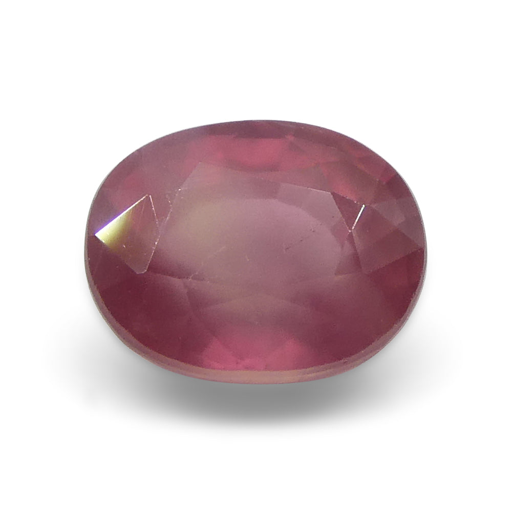 1.29ct Reddish-Pink Opalescent Sapphire from Umba, Tanzania - Unheated Oval Gemstone by SkyJems