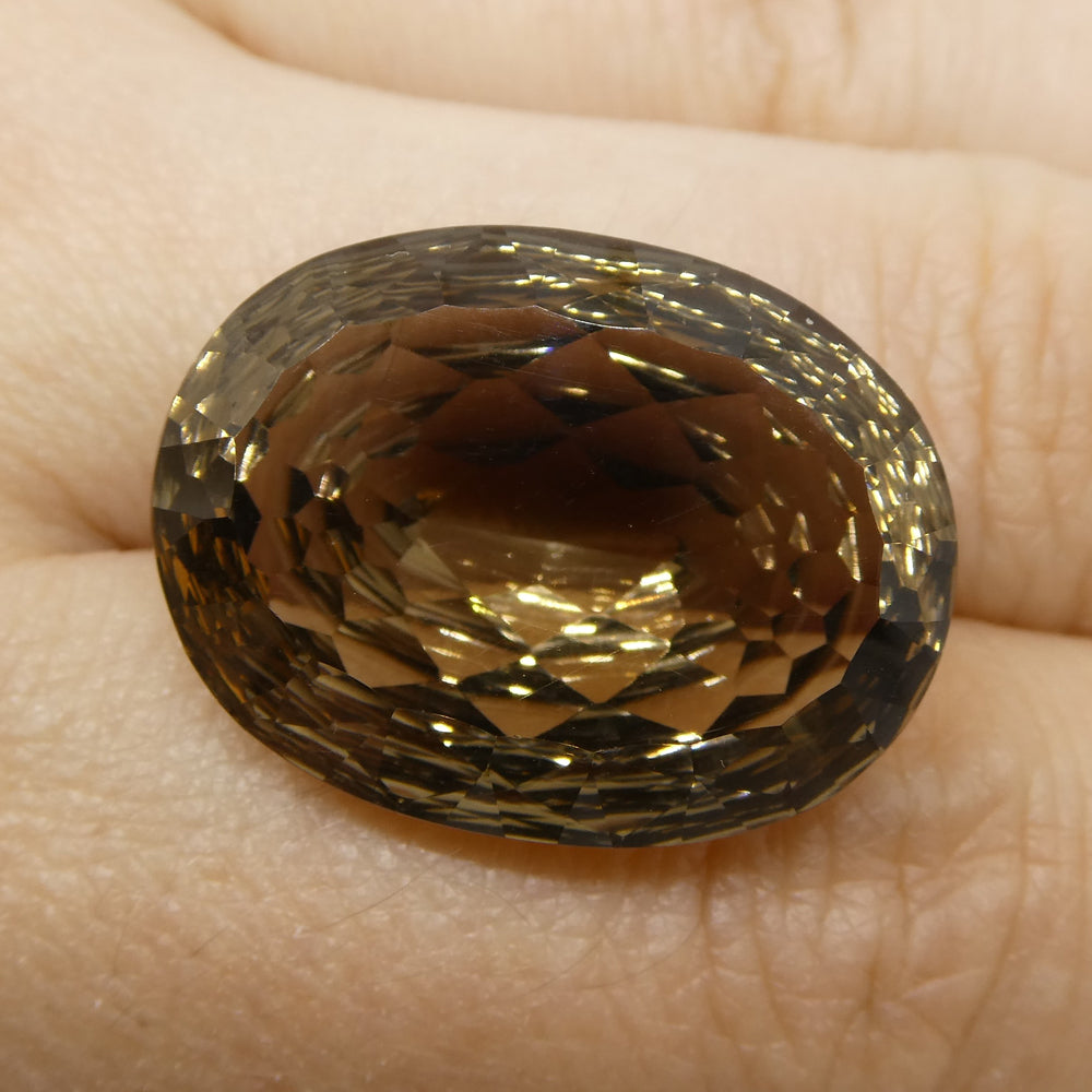 26.16 carat Brazilian Smoky Quartz oval fantasy cut gemstone from SkyJems, rich brown collector-grade natural loose stone
