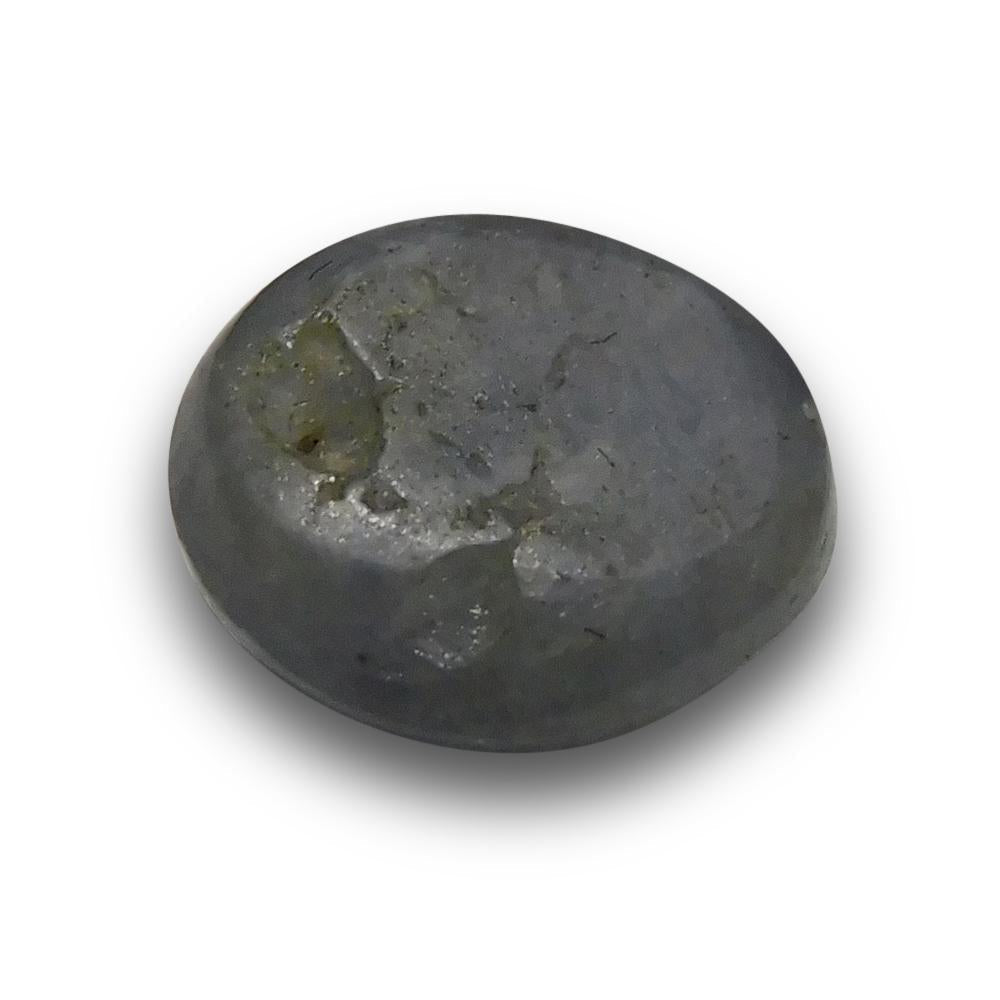 Blue-grey 6.86 ct Oval Star Sapphire from Sri Lanka, showcasing classic asterism effect, premium SkyJems gemstone collection