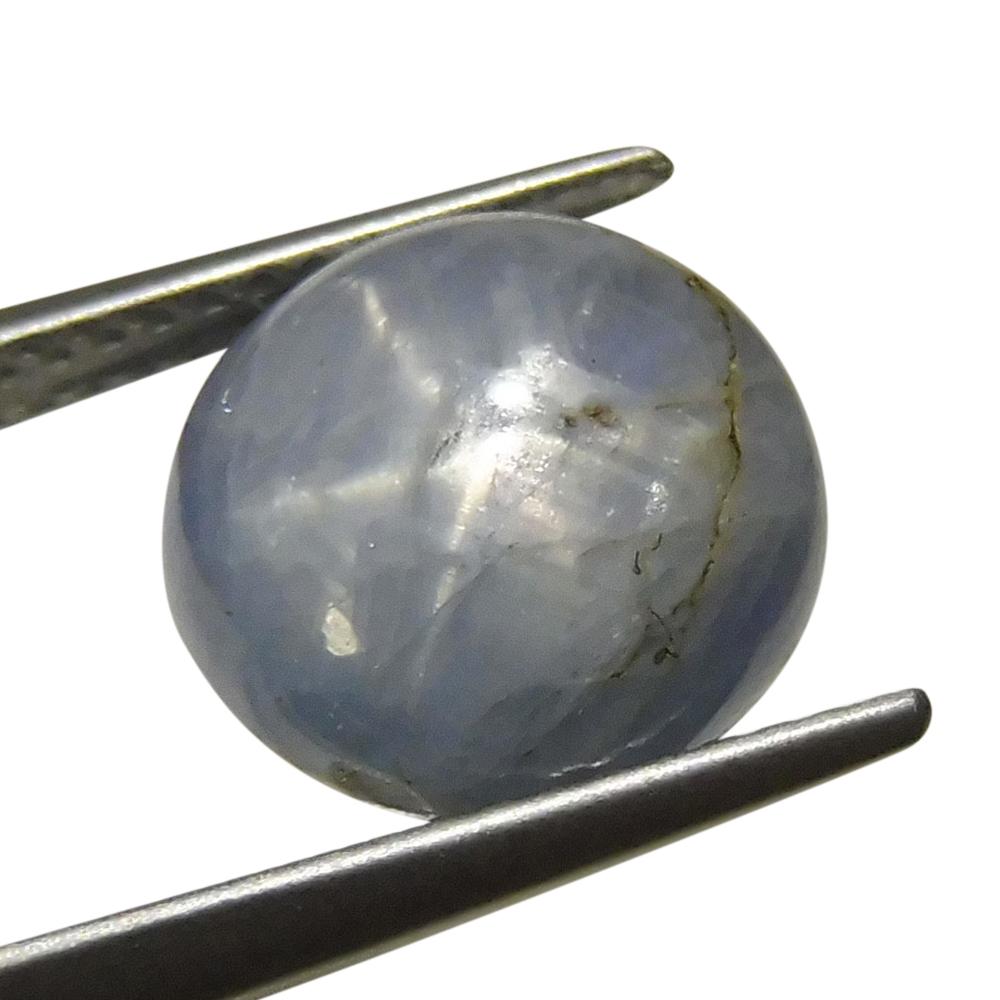 Blue round star sapphire 7.88 ct from Sri Lanka, showcasing classic asterism effect, premium gemstone by SkyJems Canadian gem