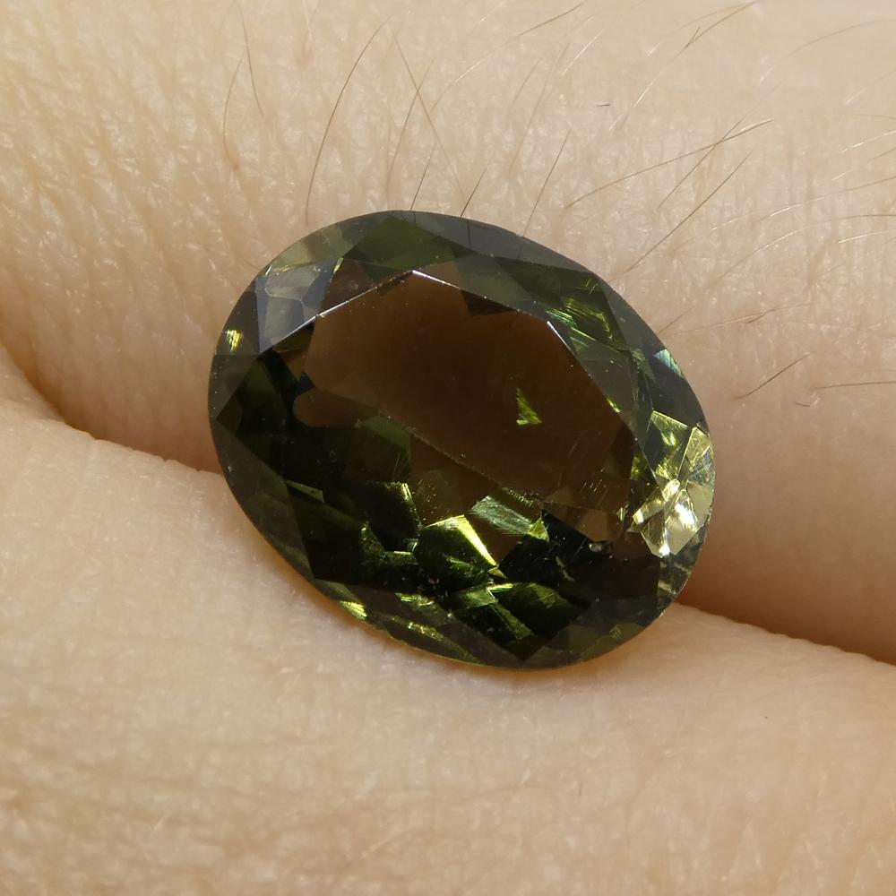 3.09ct Oval Olive Green Brazilian Tourmaline from SkyJems, premium mixed-cut single gemstone with vibrant color and clarity