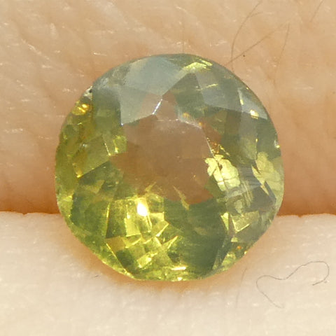 0.63ct Round Yellowish Green to Yellowish Brown Alexandrite from Sri Lanka, Unheated