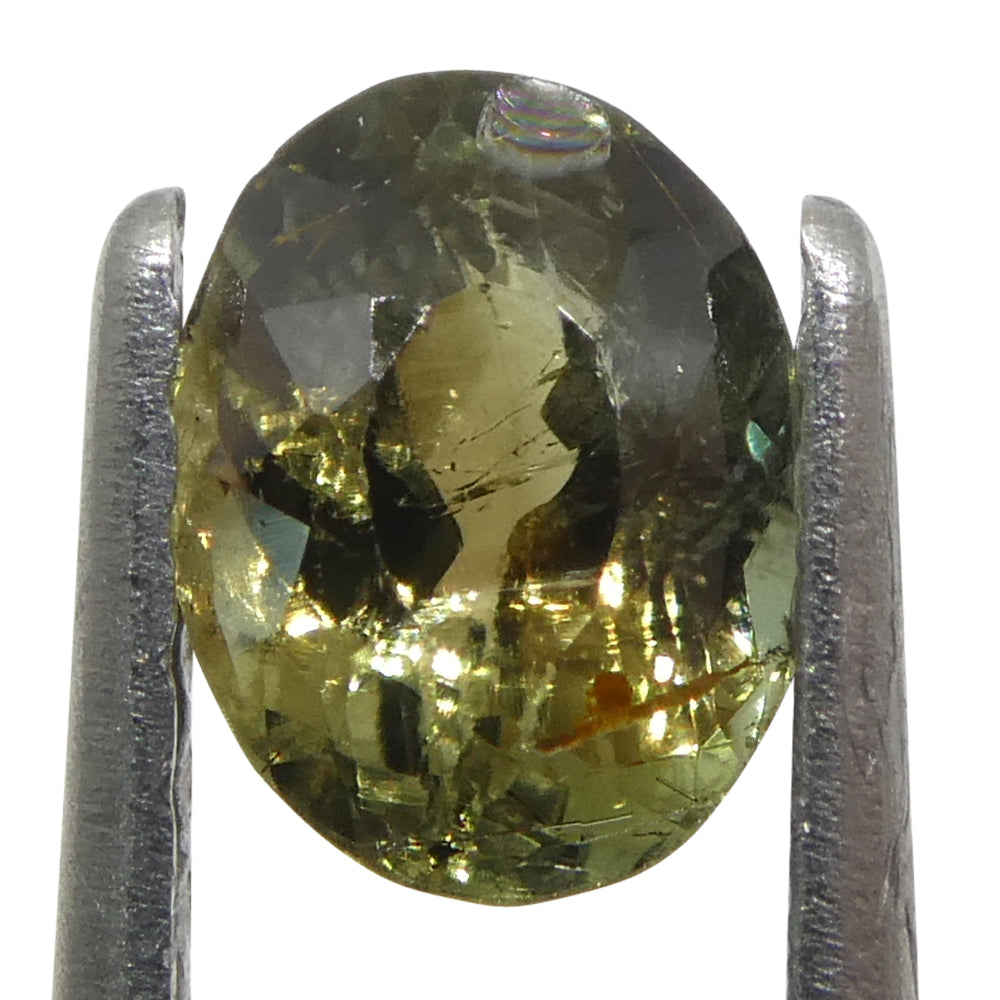 0.65ct Oval Greenish Yellow changing to Purple Alexandrite from Sri Lanka, Unheated - Skyjems Wholesale Gemstones