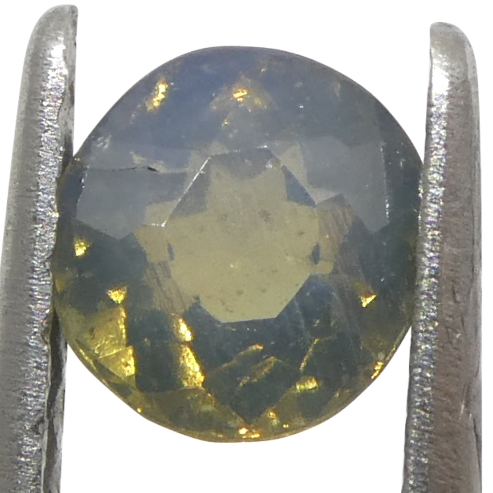 0.56ct Oval Greenish Yellow to Greyish Purple Alexandrite from Sri Lanka, Unheated - Skyjems Wholesale Gemstones