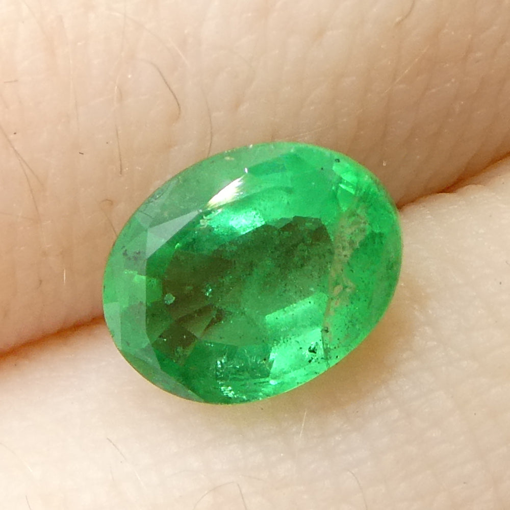 1.28ct Oval Green Emerald from Zambia - Skyjems Wholesale Gemstones