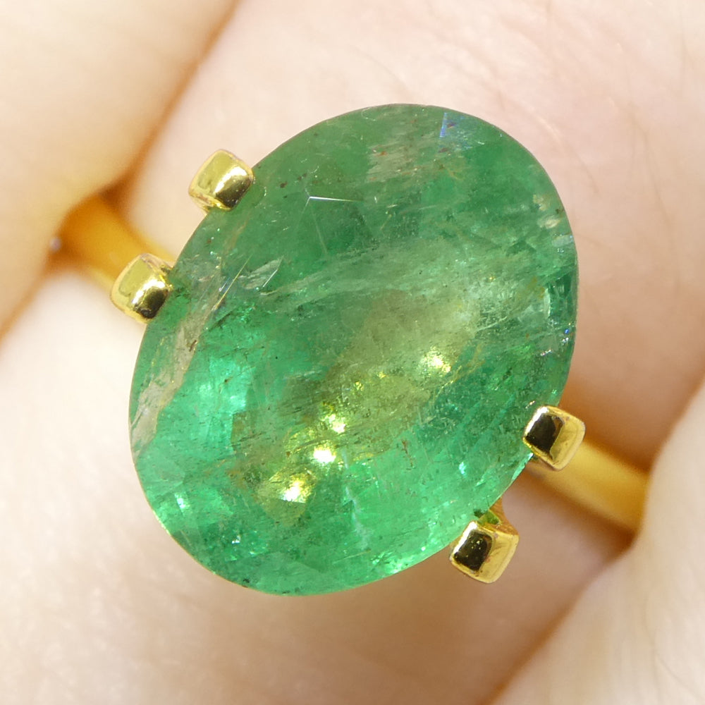3.96ct Oval Green Zambian Emerald from SkyJems, premium beryl gemstone with vibrant medium-strong color and classic step cut
