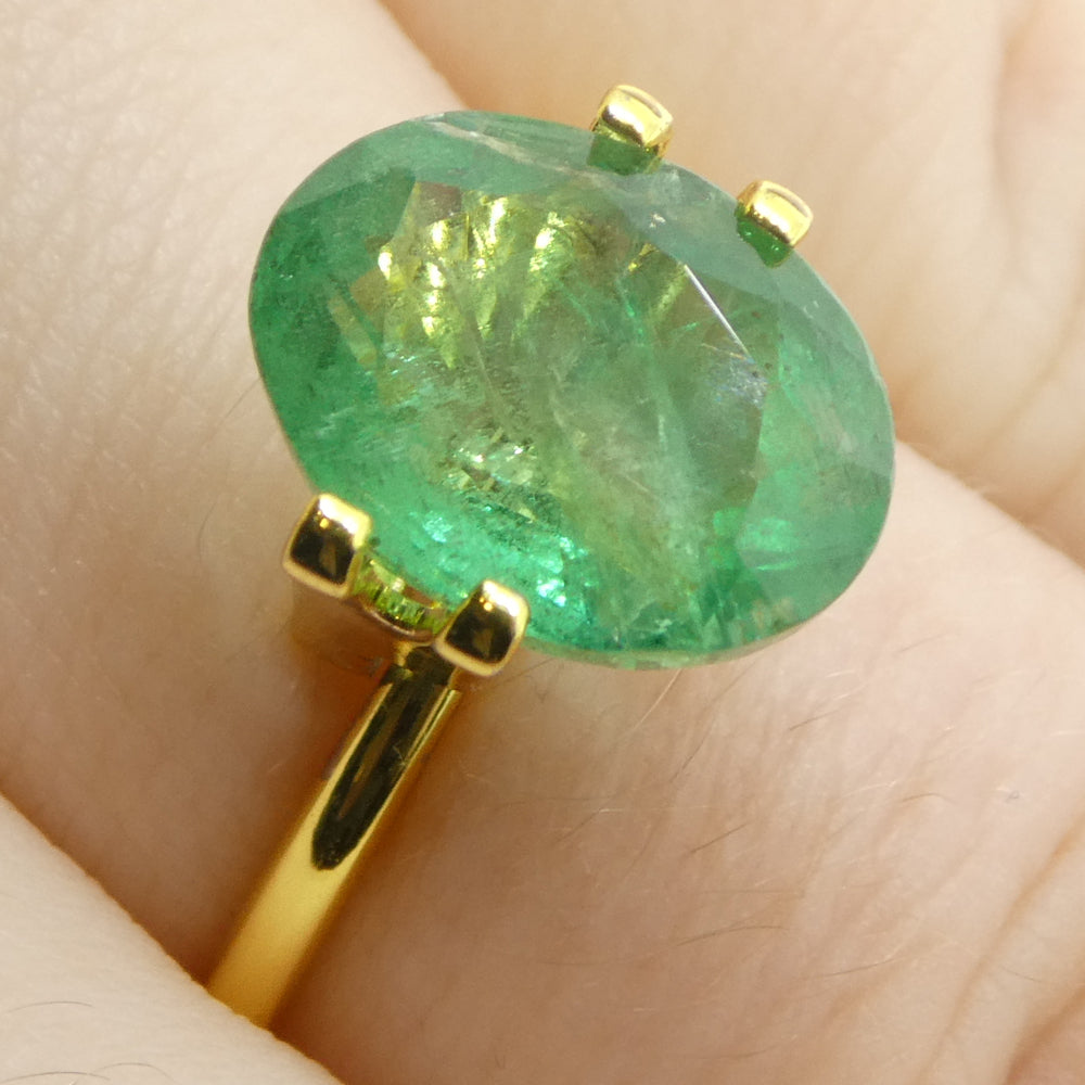 3.96ct Oval Green Zambian Emerald from SkyJems, premium beryl gemstone with vibrant medium-strong color and classic step cut