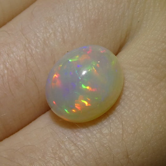 4.24ct Oval Cabochon White Welo Opal from Ethiopia - Skyjems Wholesale Gemstones