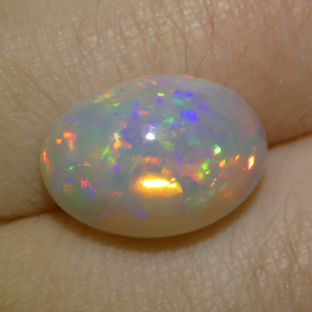 3.54ct Oval Cabochon White Welo Opal from Ethiopia - Skyjems Wholesale Gemstones