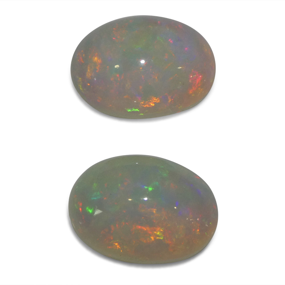 Opal 8.94 cts 14.05 x 10.16 x 5.72 mm, 14.07 x 10.00 x 7.30 mm Oval White  $2240