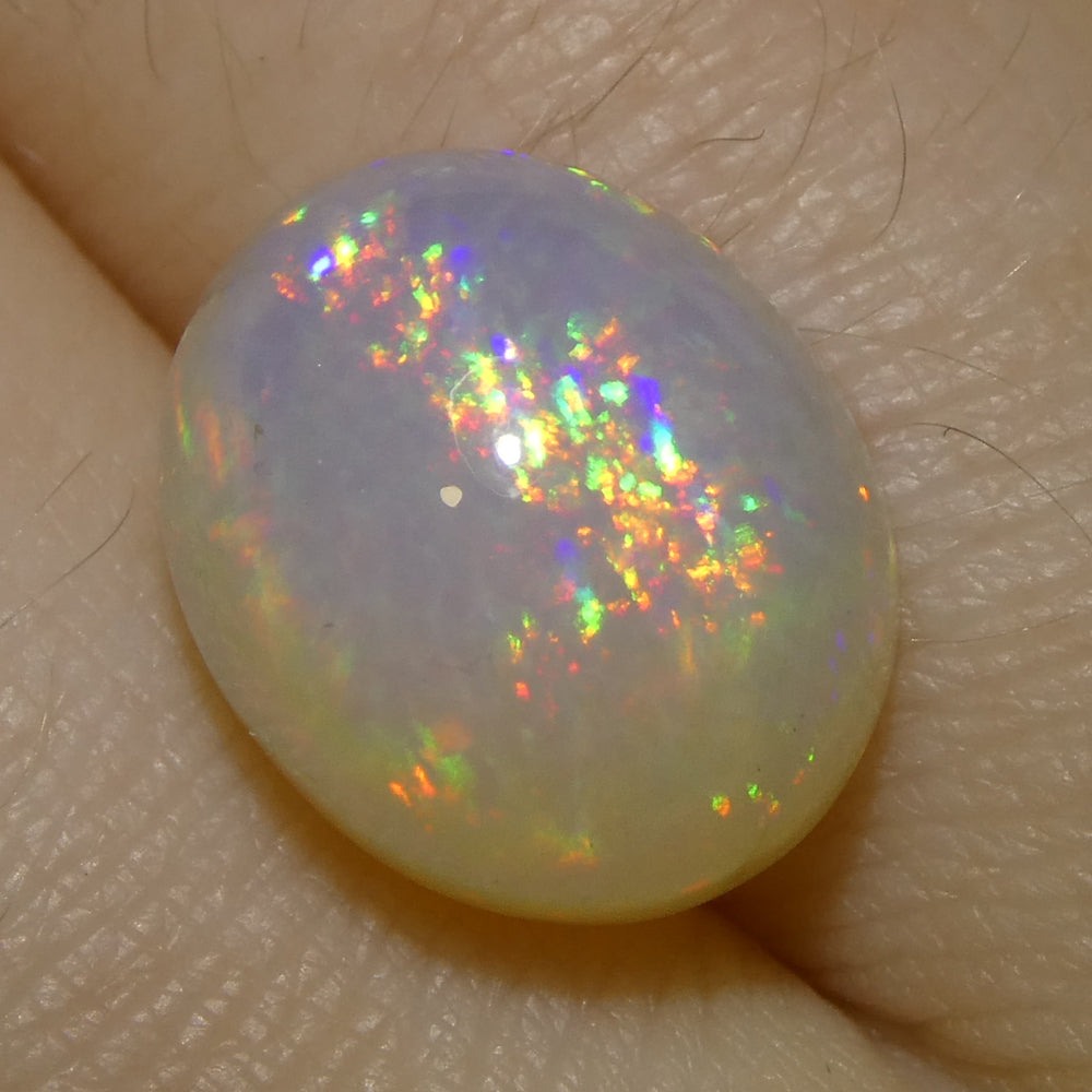 4.31ct Oval Cabochon White Crystal Opal from Ethiopia - Skyjems Wholesale Gemstones