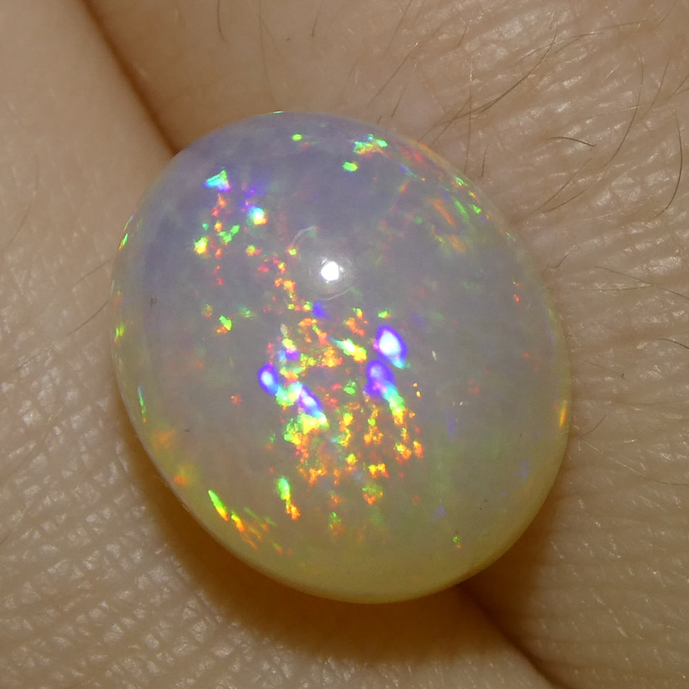 4.31ct Oval Cabochon White Crystal Opal from Ethiopia - Skyjems Wholesale Gemstones