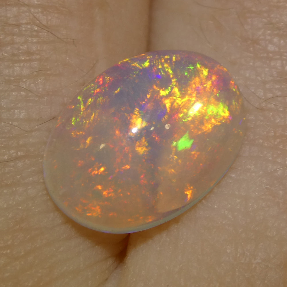 2.71ct Oval Cabochon White Crystal Opal from Ethiopia - Skyjems Wholesale Gemstones