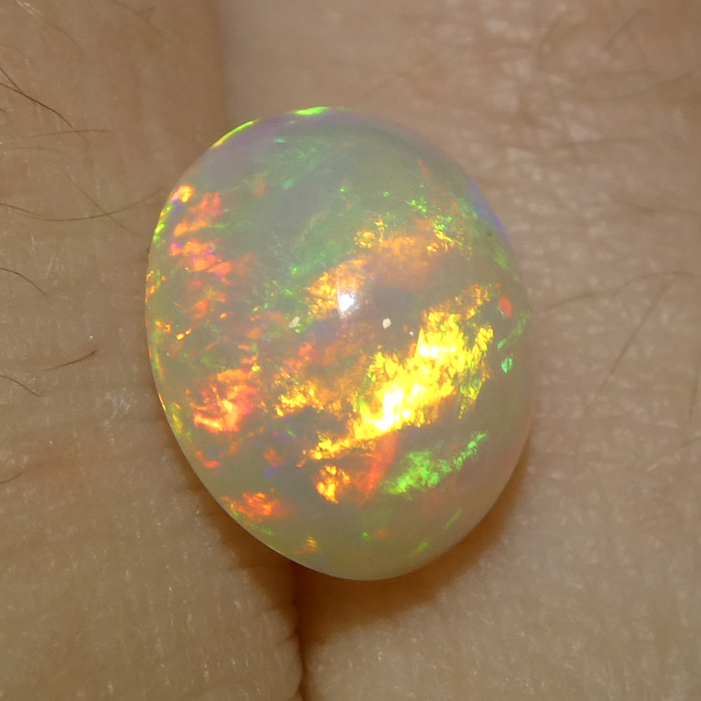 2.57ct Oval Cabochon White Crystal Opal from Ethiopia - Skyjems Wholesale Gemstones