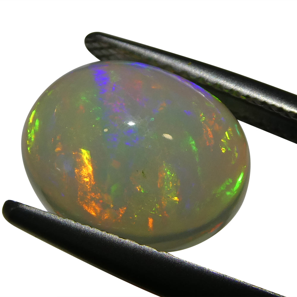 2.57ct Oval Cabochon White Crystal Opal from Ethiopia - Skyjems Wholesale Gemstones