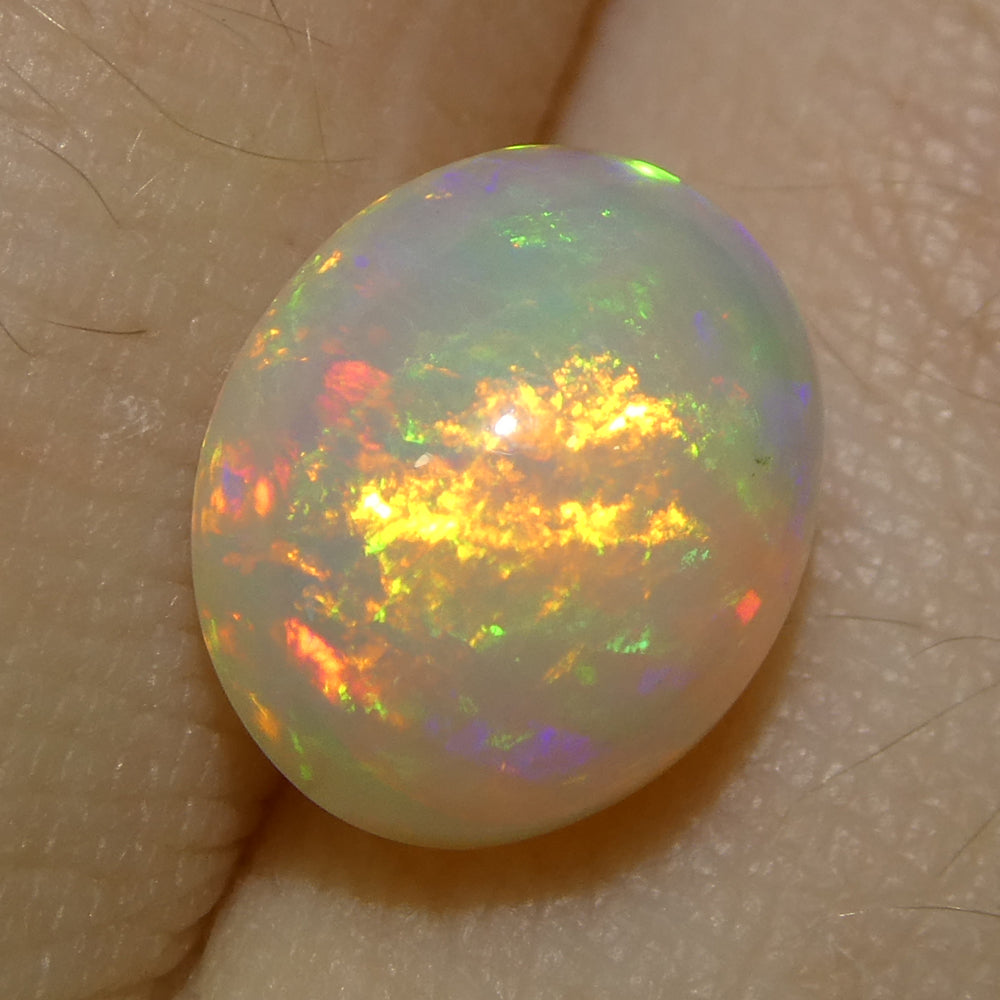 2.57ct Oval Cabochon White Crystal Opal from Ethiopia - Skyjems Wholesale Gemstones