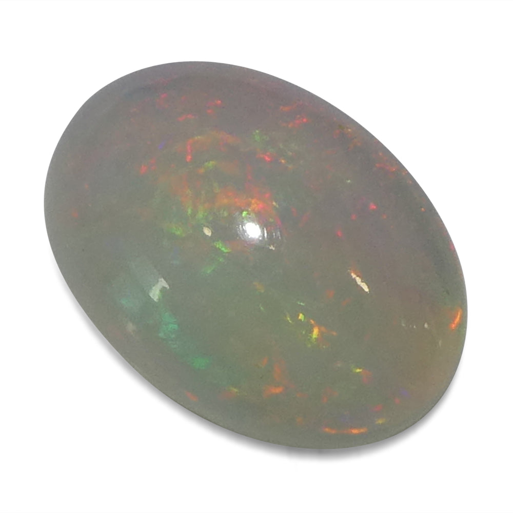3.48ct White Crystal Opal from Ethiopia, oval cabochon gemstone with play of colour by SkyJems Canadian gem experts