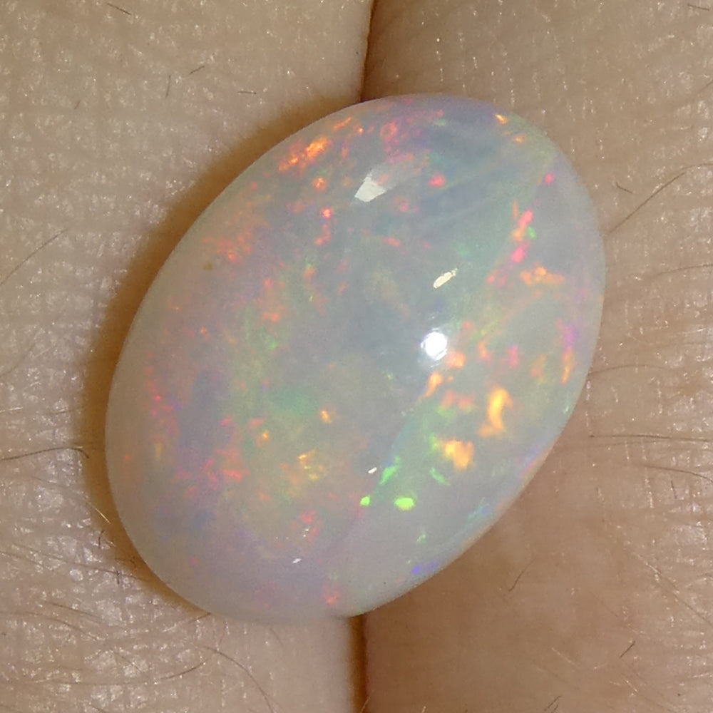 3.48ct Oval Cabochon White Crystal Opal from Ethiopia - Skyjems Wholesale Gemstones