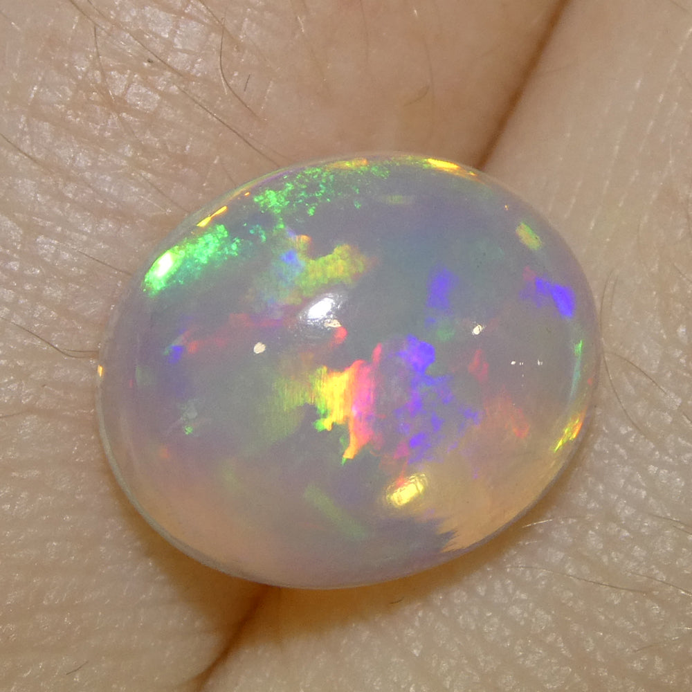 3.82ct Oval Cabochon White Crystal Opal from Ethiopia - Skyjems Wholesale Gemstones