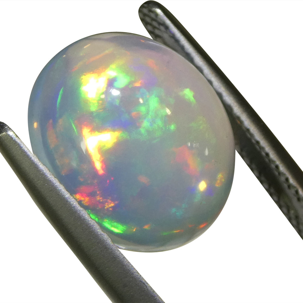 3.82ct Oval Cabochon White Crystal Opal from Ethiopia - Skyjems Wholesale Gemstones