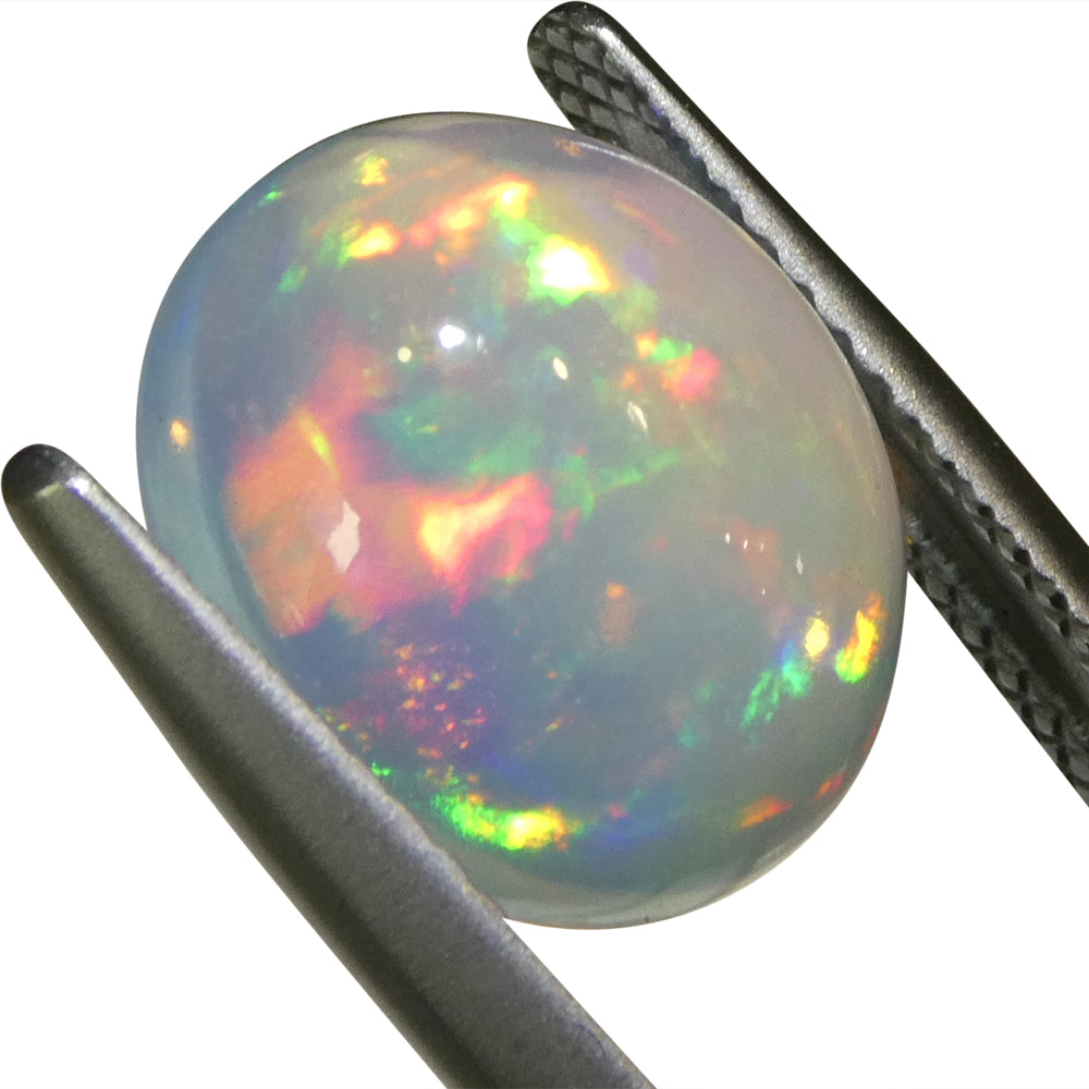 3.82ct Oval Cabochon White Crystal Opal from Ethiopia - Skyjems Wholesale Gemstones