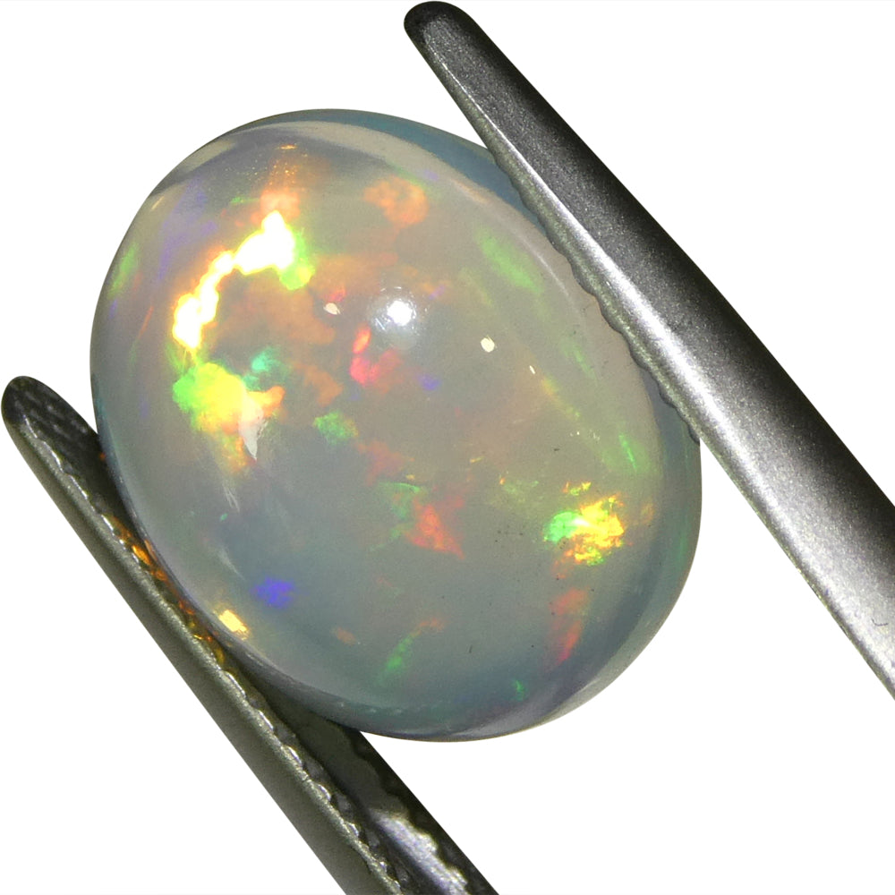 3.82ct Oval Cabochon White Crystal Opal from Ethiopia - Skyjems Wholesale Gemstones