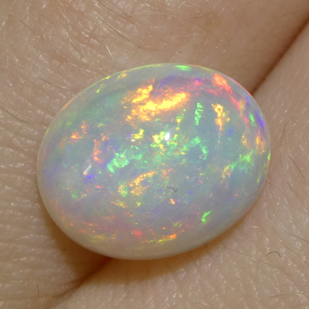 3.15ct Oval Cabochon White Crystal Opal from Ethiopia - Skyjems Wholesale Gemstones