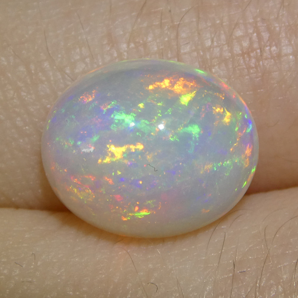 3.15ct Oval Cabochon White Crystal Opal from Ethiopia - Skyjems Wholesale Gemstones