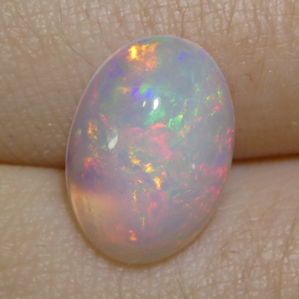 3.32ct Oval Cabochon White Crystal Opal from Ethiopia - Skyjems Wholesale Gemstones