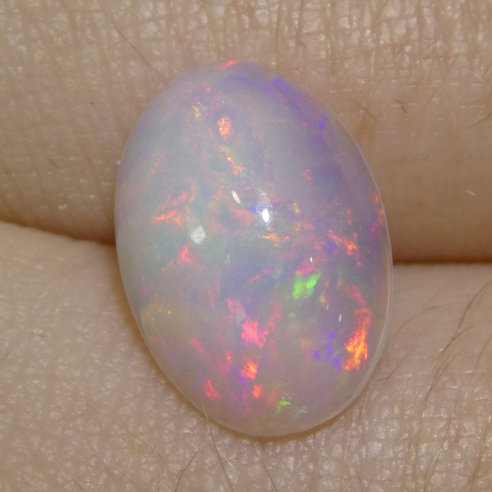 3.32ct Oval Cabochon White Crystal Opal from Ethiopia - Skyjems Wholesale Gemstones