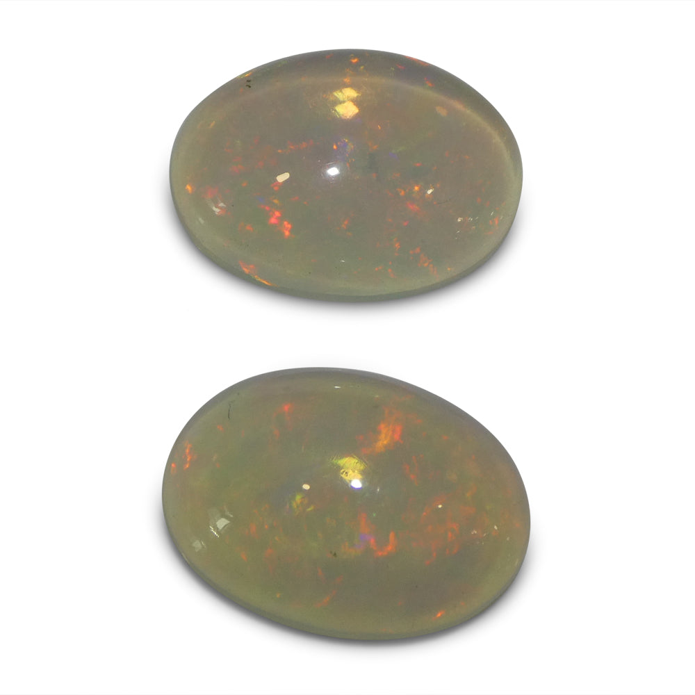 SkyJems 6.8ct Oval White Crystal Opal Pair from Ethiopia, rare matching gemstones with vibrant play of color