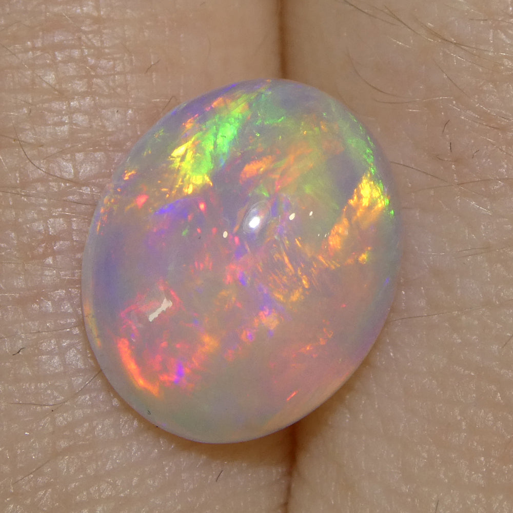 3.24ct Oval Cabochon White Crystal Opal from Ethiopia - Skyjems Wholesale Gemstones