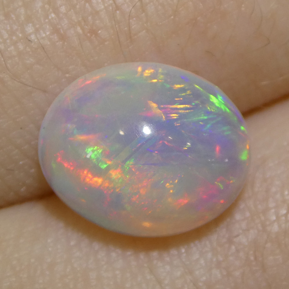 3.24ct Oval Cabochon White Crystal Opal from Ethiopia - Skyjems Wholesale Gemstones