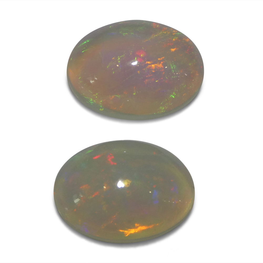 Opal 8.29 cts 13.84 x 10.09 x 6.68 mm, 13.84 x 10.00 x 6.25 mm Oval White  $2080