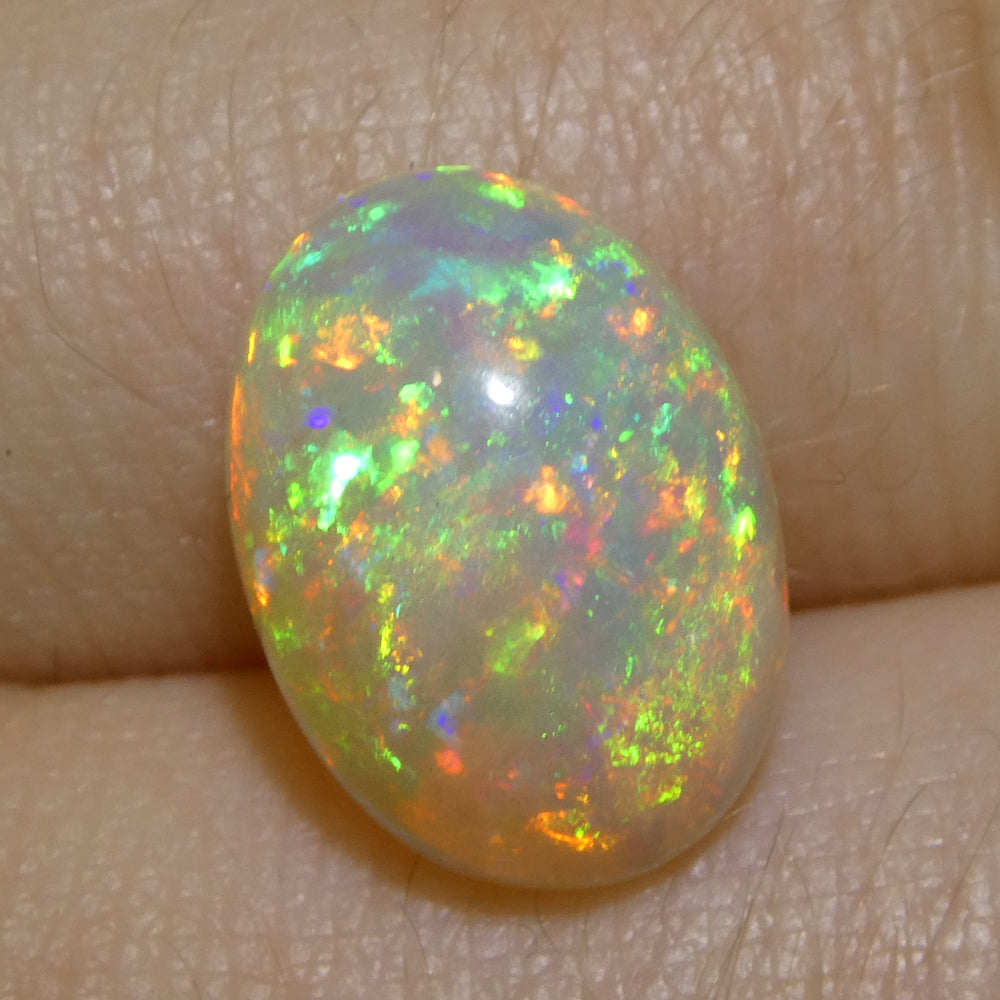 4.13ct Oval Cabochon White Crystal Opal from Ethiopia - Skyjems Wholesale Gemstones