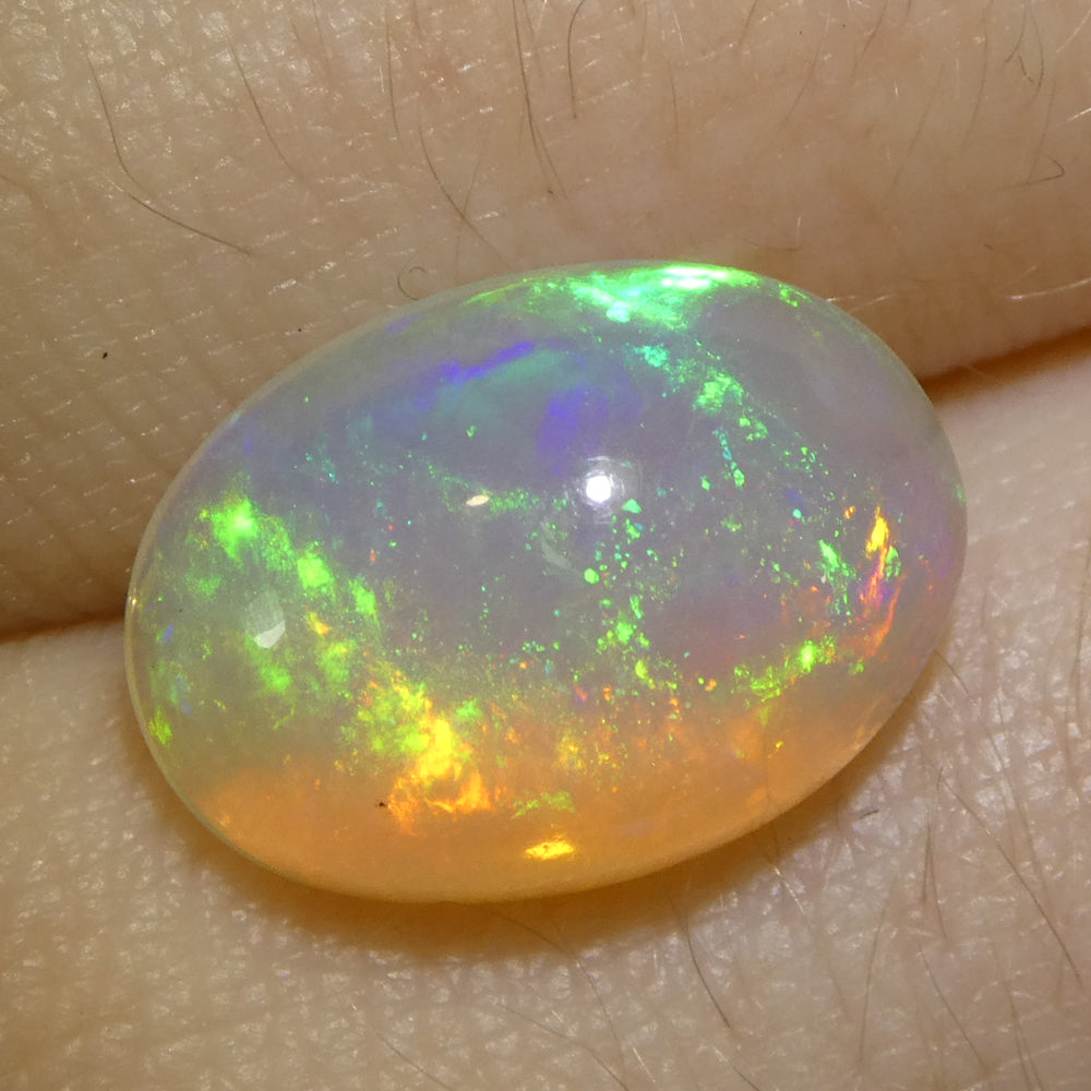 3.45ct Oval Cabochon White Crystal Opal from Ethiopia - Skyjems Wholesale Gemstones